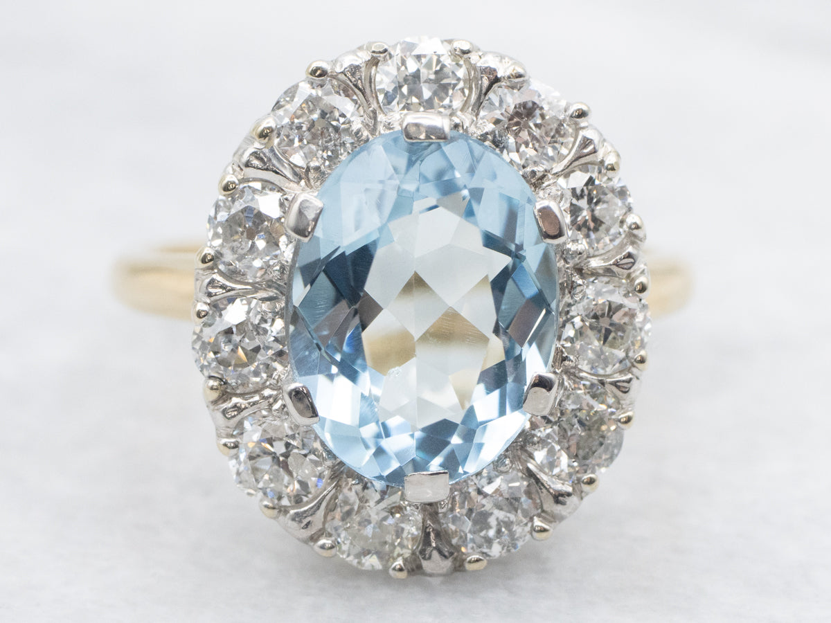 Modern Aquamarine and Diamond Halo Ring