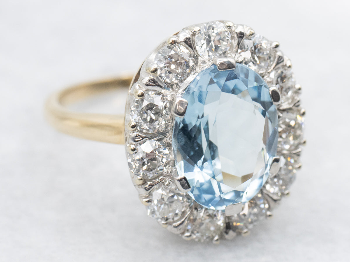Modern Aquamarine and Diamond Halo Ring