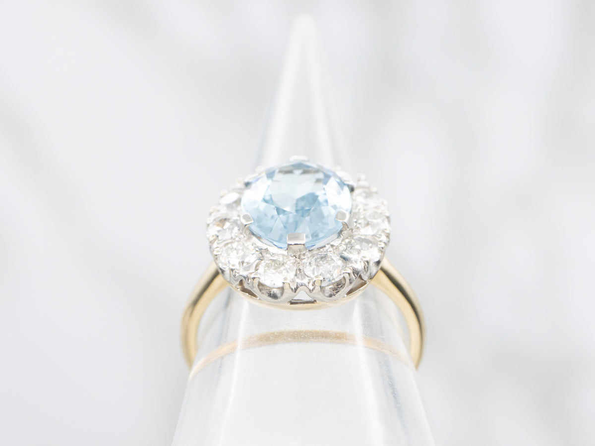 Modern Aquamarine and Diamond Halo Ring