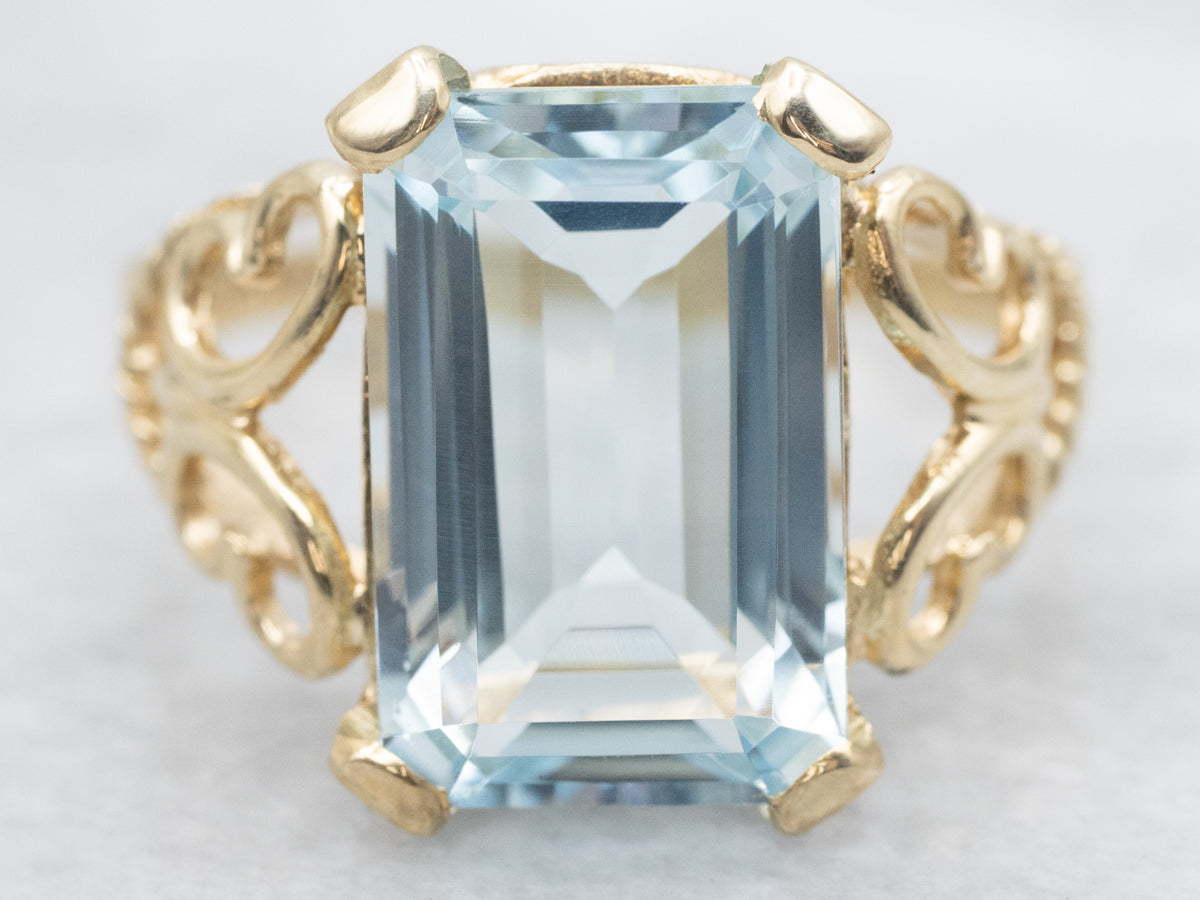 Aquamarine Solitaire Ring with Scrolling Openwork Shank