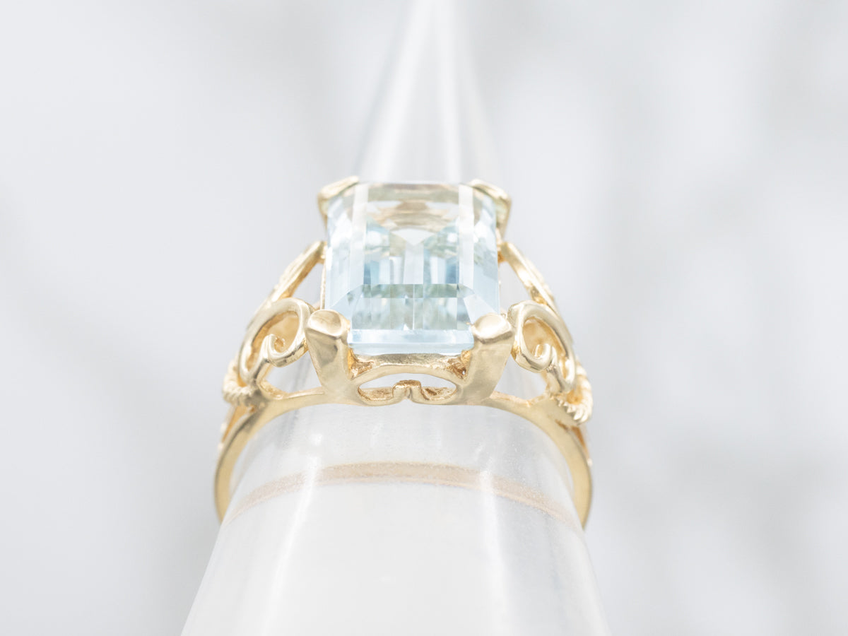 Aquamarine Solitaire Ring with Scrolling Openwork Shank