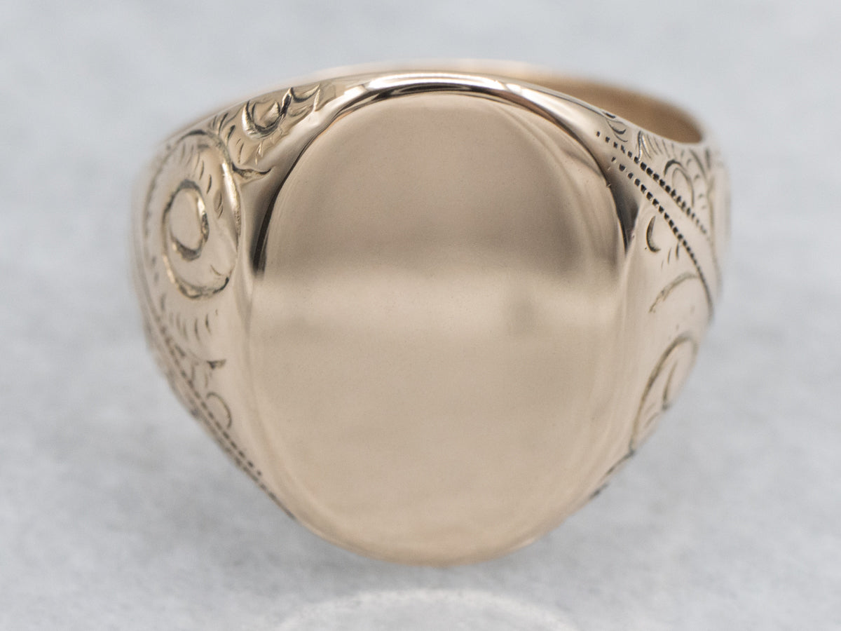 Antique Oval-Face Signet Ring with Scrolling Shoulders