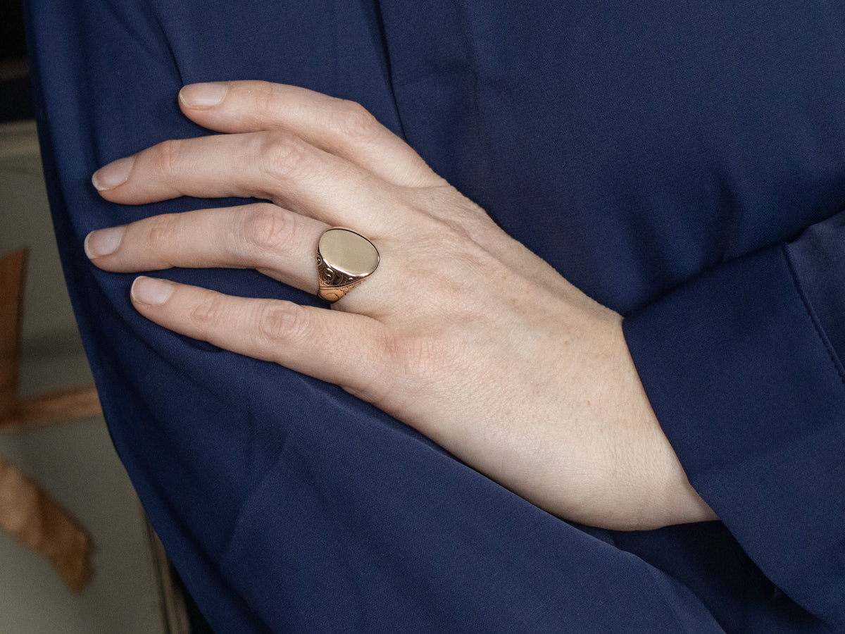 Antique Oval-Face Signet Ring with Scrolling Shoulders