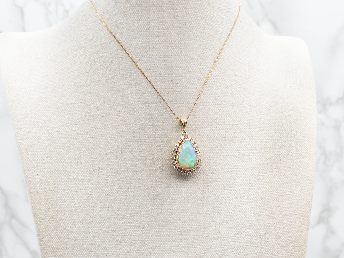 Pear Cut Opal and Diamond Halo Pendant