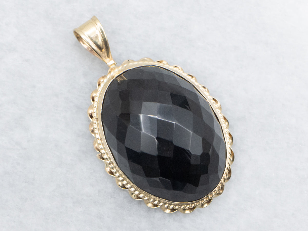 Faceted Obsidian Solitaire Pendant with Twisted Frame