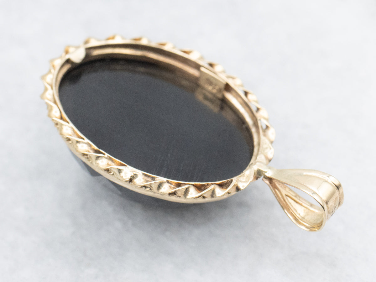 Faceted Obsidian Solitaire Pendant with Twisted Frame