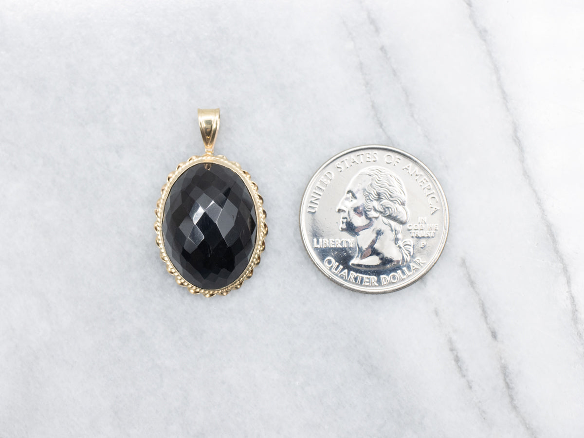 Faceted Obsidian Solitaire Pendant with Twisted Frame
