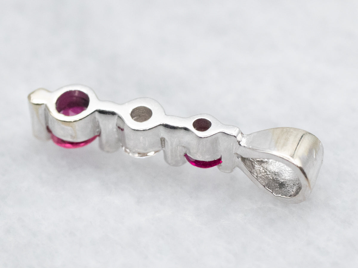 Modern Gold Ruby and Diamond Pendant