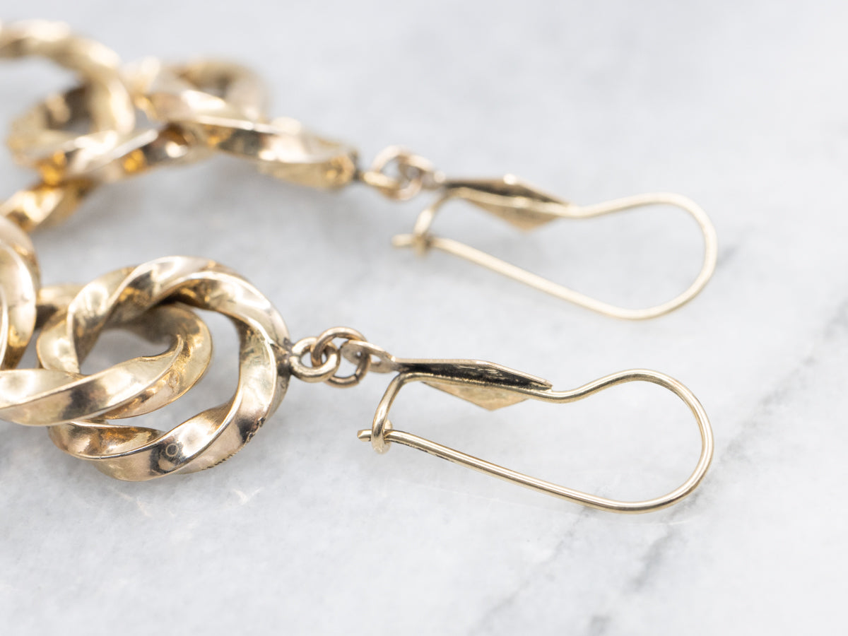 Twisting Graduating Gold Ring Drop Earrings