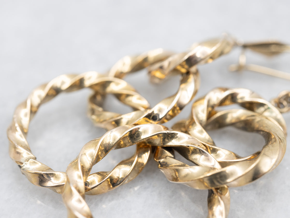 Twisting Graduating Gold Ring Drop Earrings