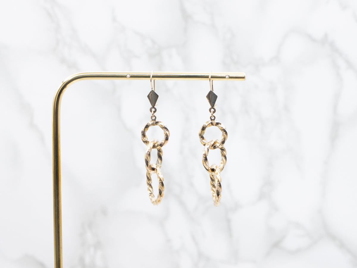 Twisting Graduating Gold Ring Drop Earrings
