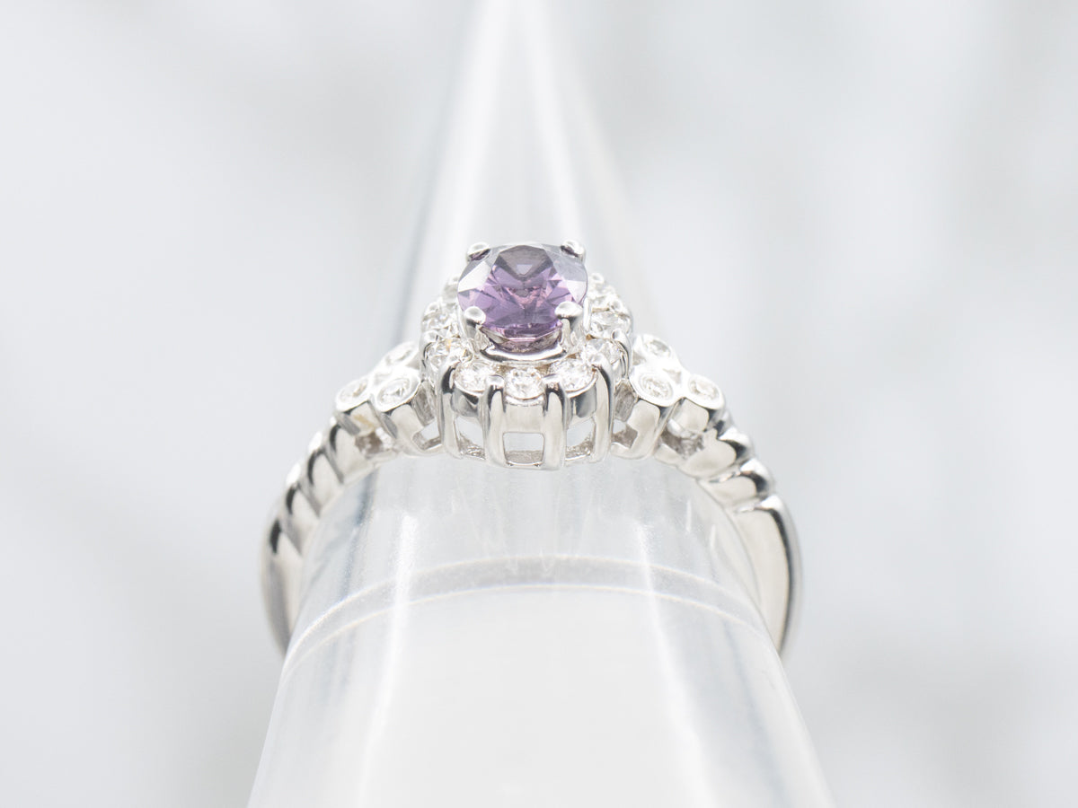 Pretty Purple Spinel and Diamond Halo Ring