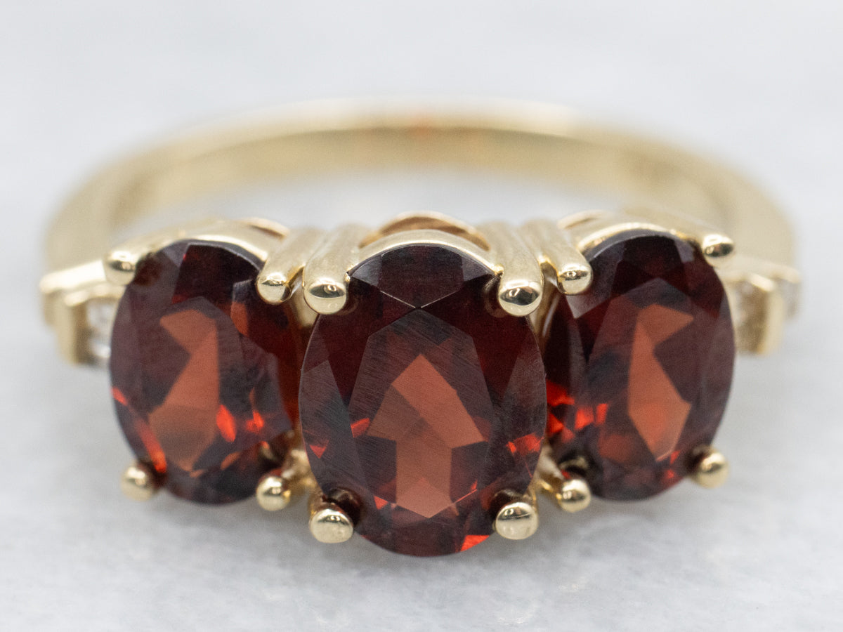 Three Stone Garnet and Diamond Ring