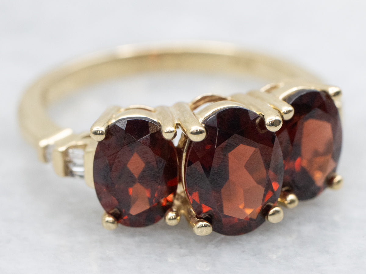 Three Stone Garnet and Diamond Ring