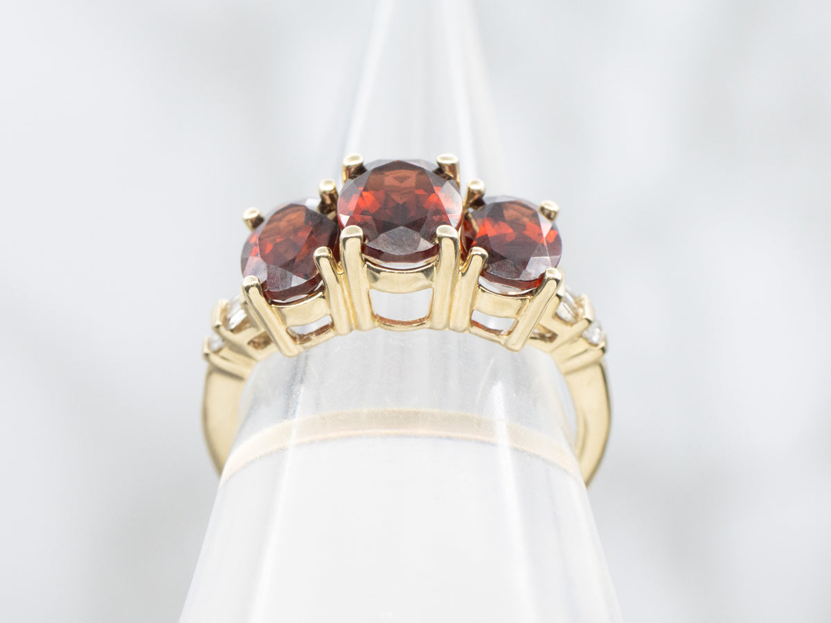Three Stone Garnet and Diamond Ring