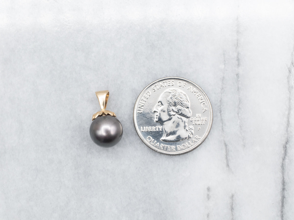 Black Pearl and Gold Pendant