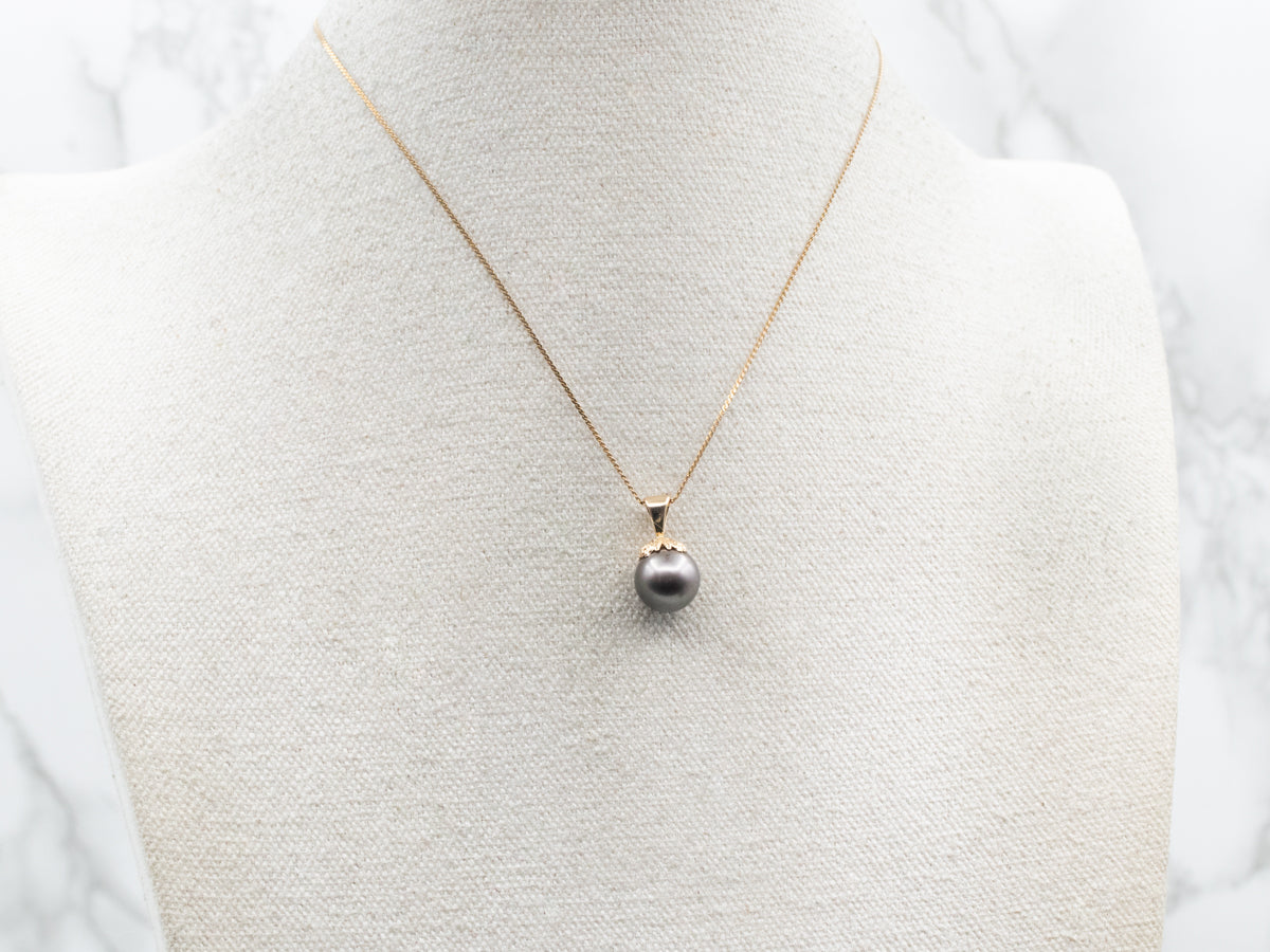 Black Pearl and Gold Pendant