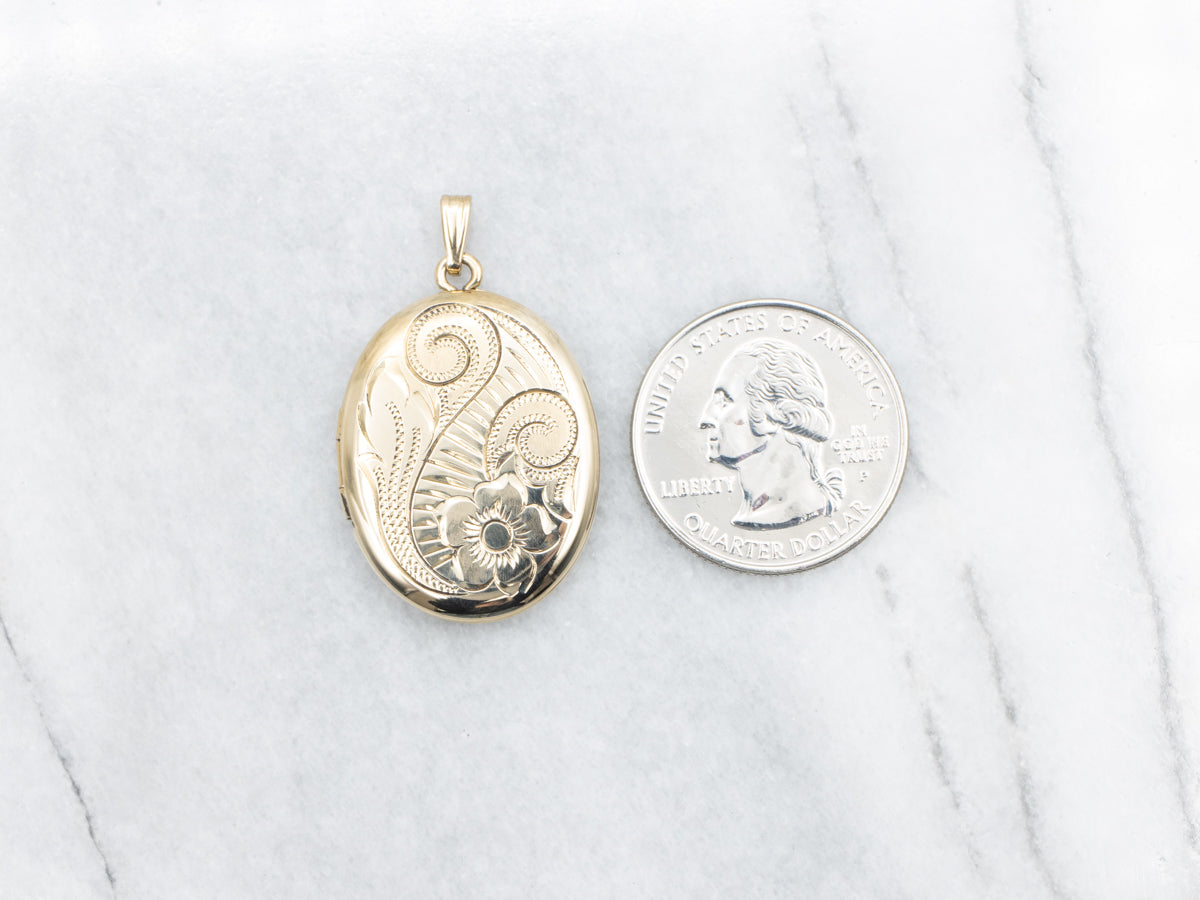 Large Gold Oval Locket with Floral Motifs
