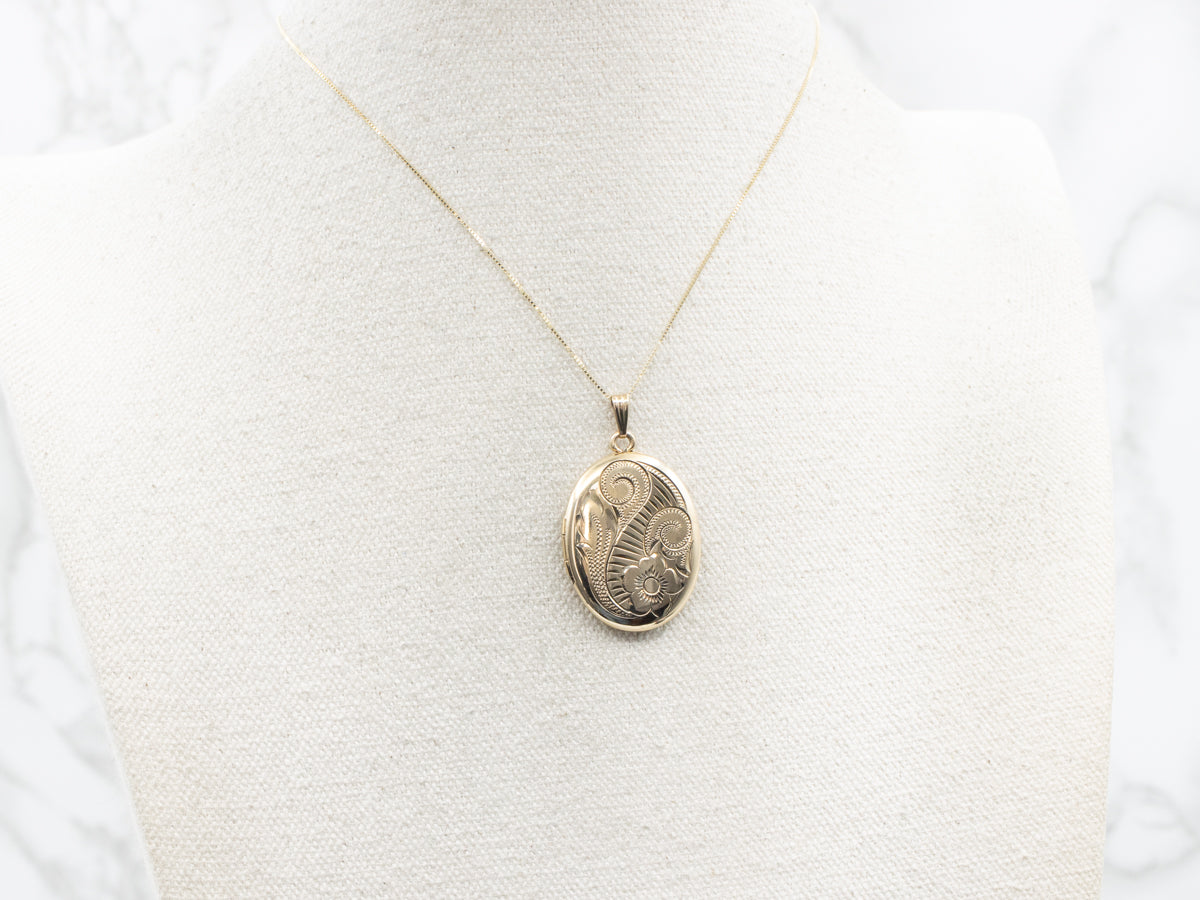 Large Gold Oval Locket with Floral Motifs