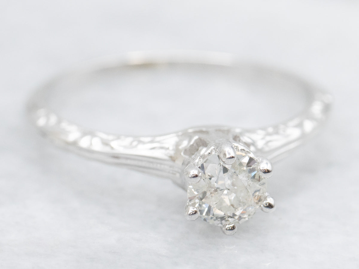 Ornate Diamond Solitaire Engagement Ring with Etched Shoulders