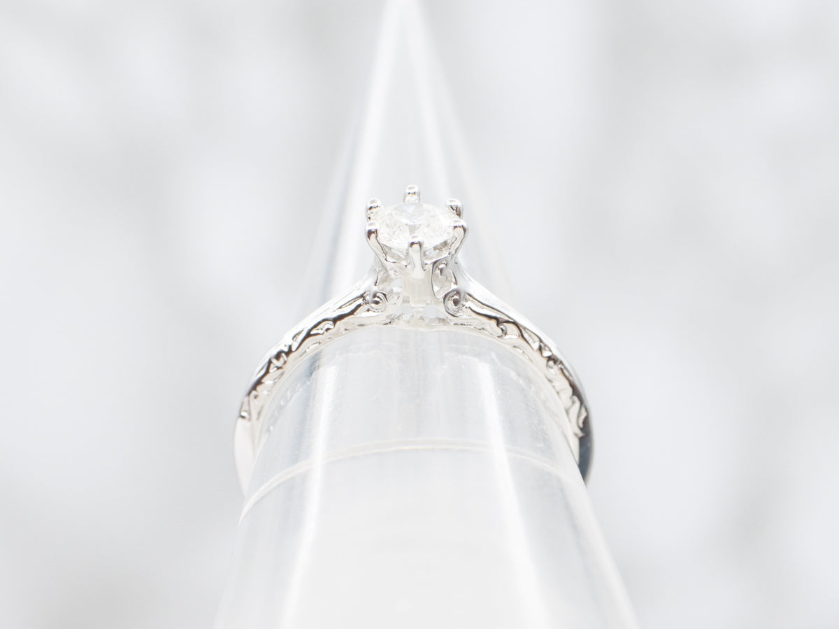 Ornate Diamond Solitaire Engagement Ring with Etched Shoulders