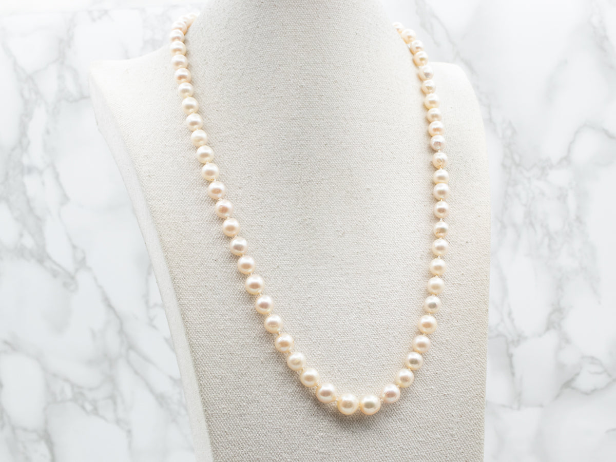 Vintage Graduated Pearl Strand with Flower Clasp