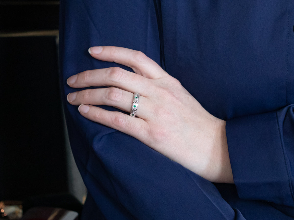 Swirling Synthetic Emerald Eternity Band