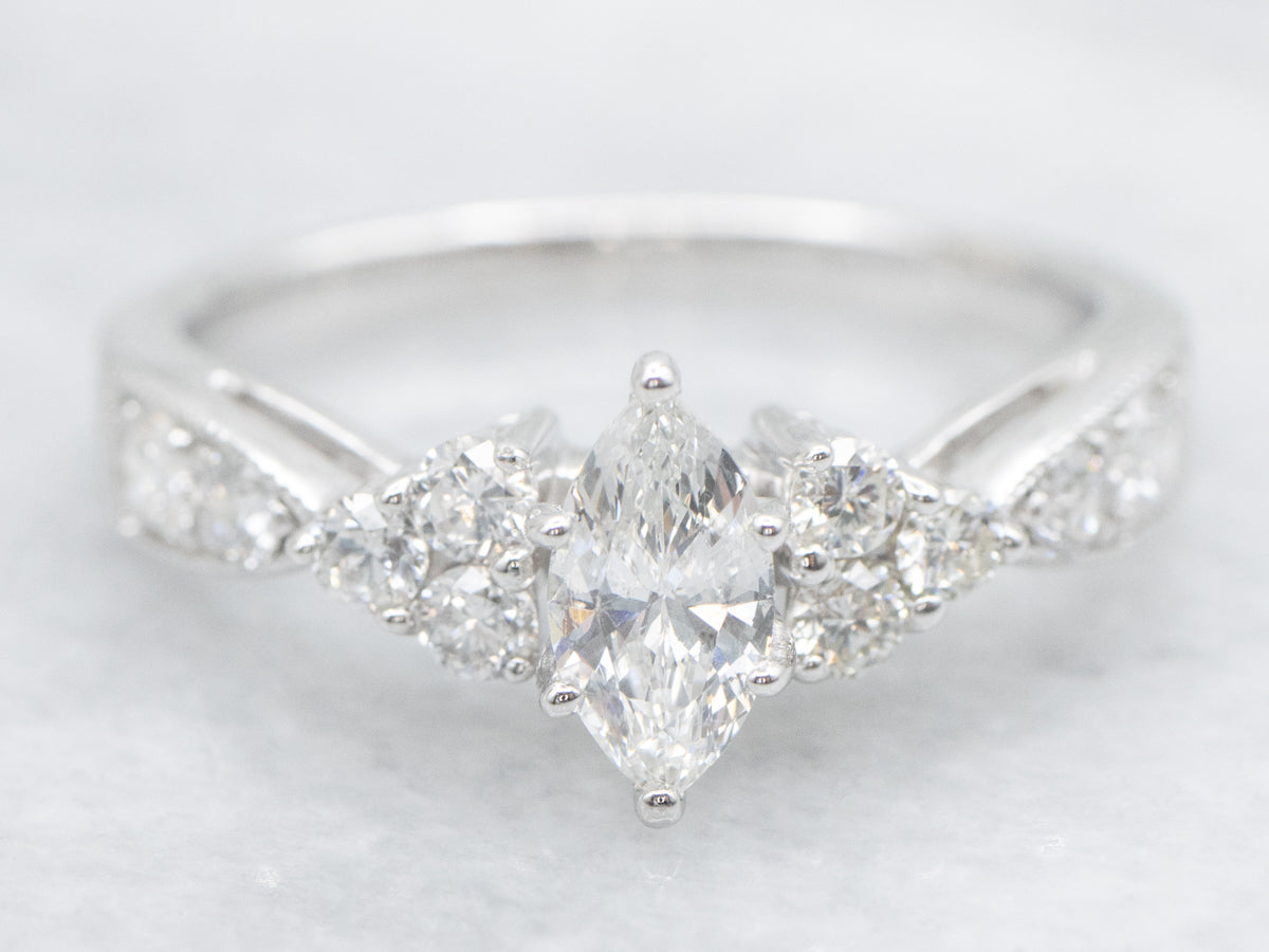 Modern Marquise-Cut Diamond Engagement Ring with Diamond Accents