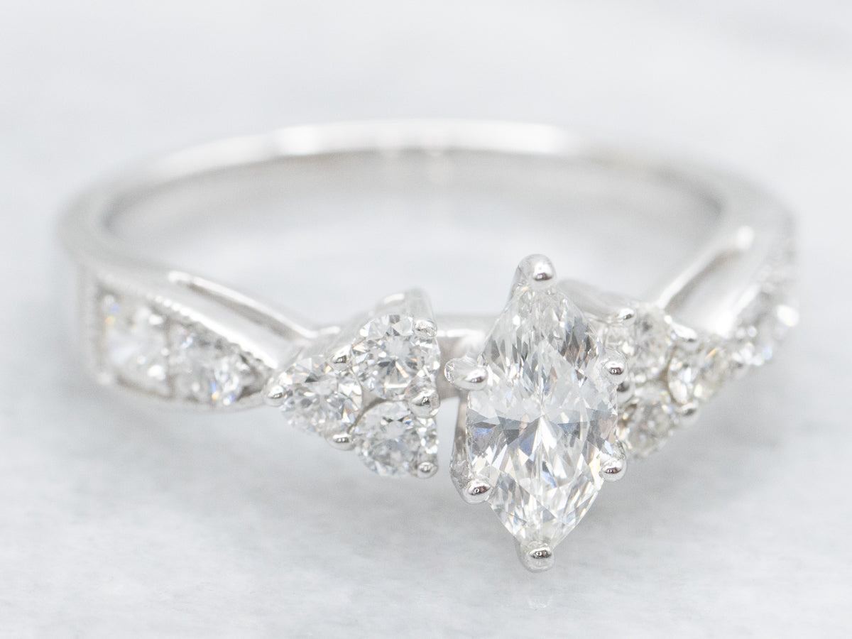 Modern Marquise-Cut Diamond Engagement Ring with Diamond Accents