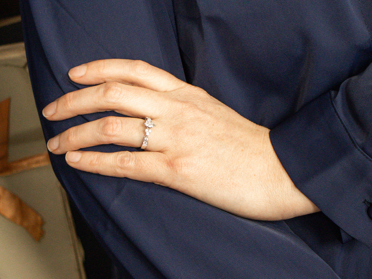 Modern Marquise-Cut Diamond Engagement Ring with Diamond Accents