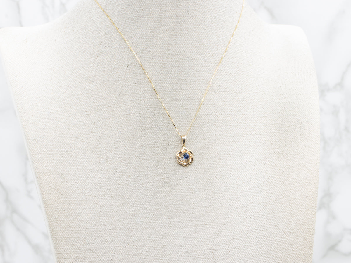 Sapphire Solitaire Pendant in Floral Frame
