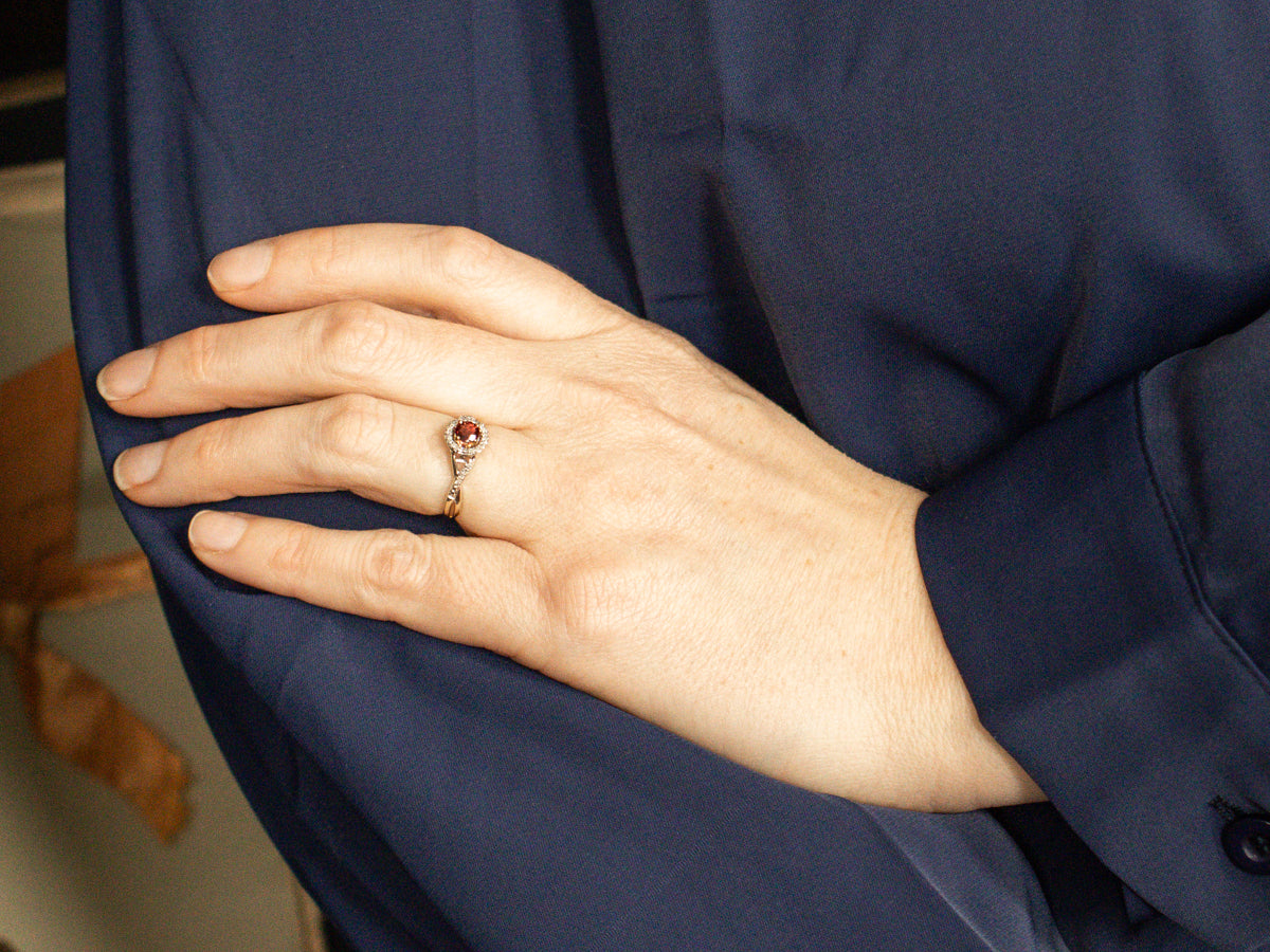 Modern Ruby and Diamond Halo Twisted Shank Ring