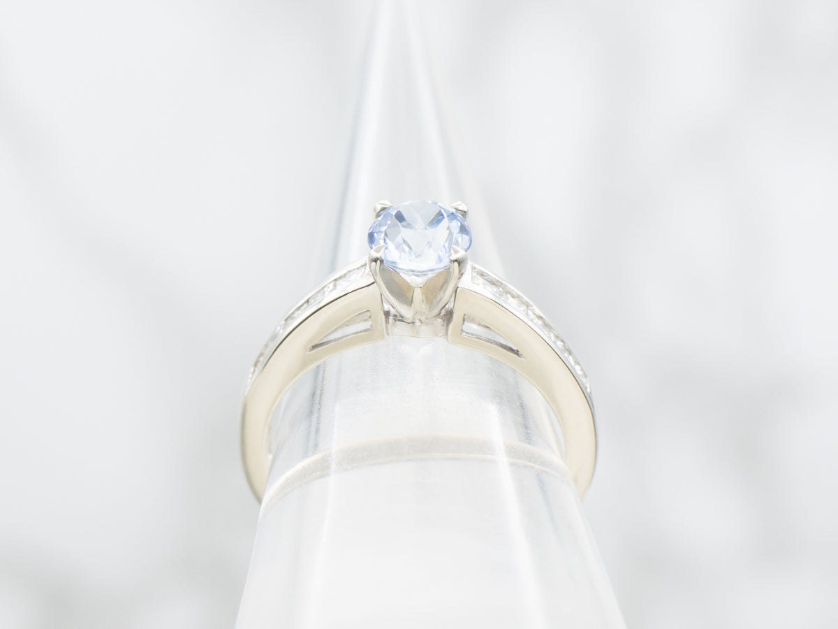 Lightly Hued Sapphire and Princess Cut Diamond Engagement Ring