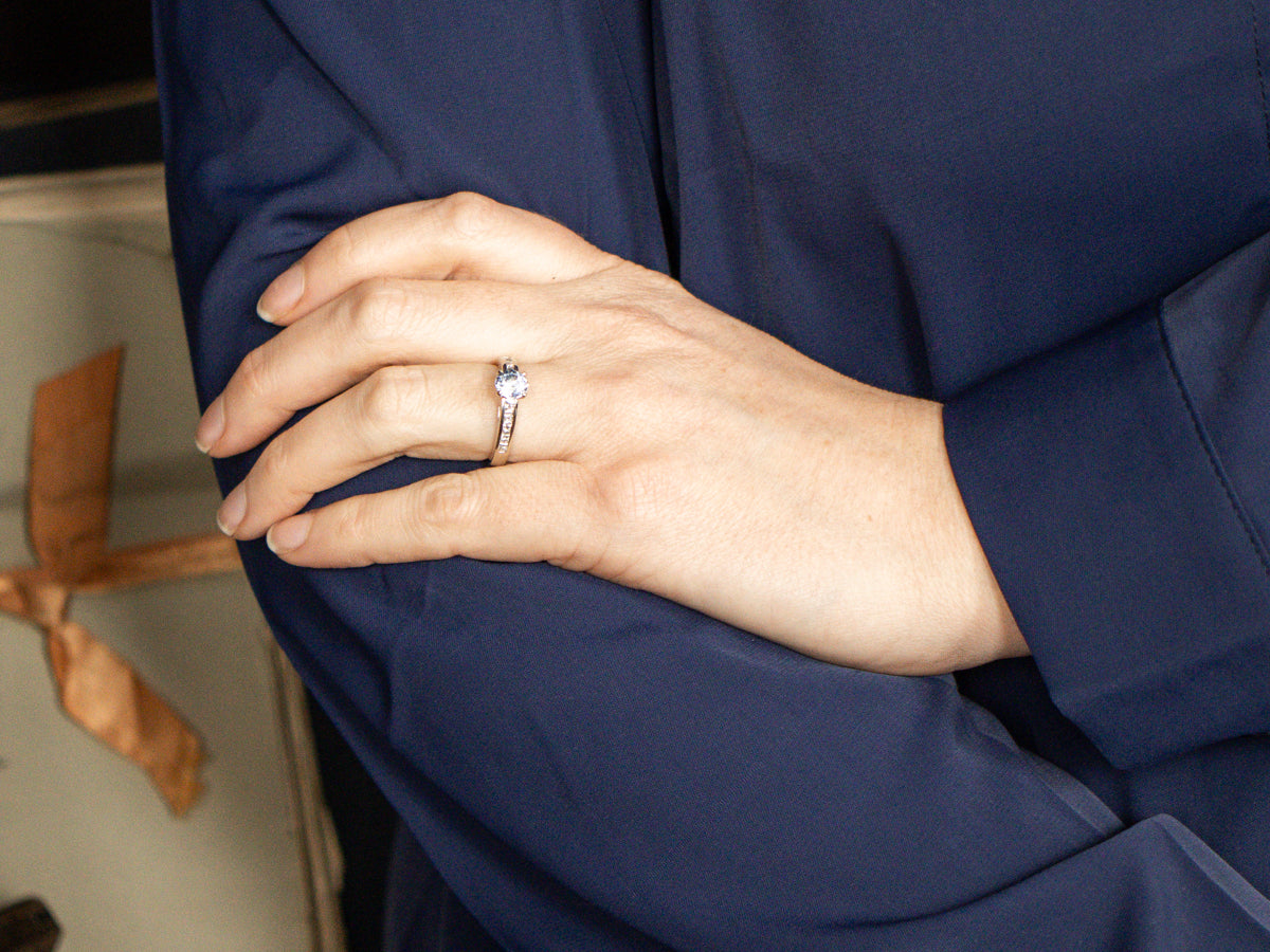 Lightly Hued Sapphire and Princess Cut Diamond Engagement Ring