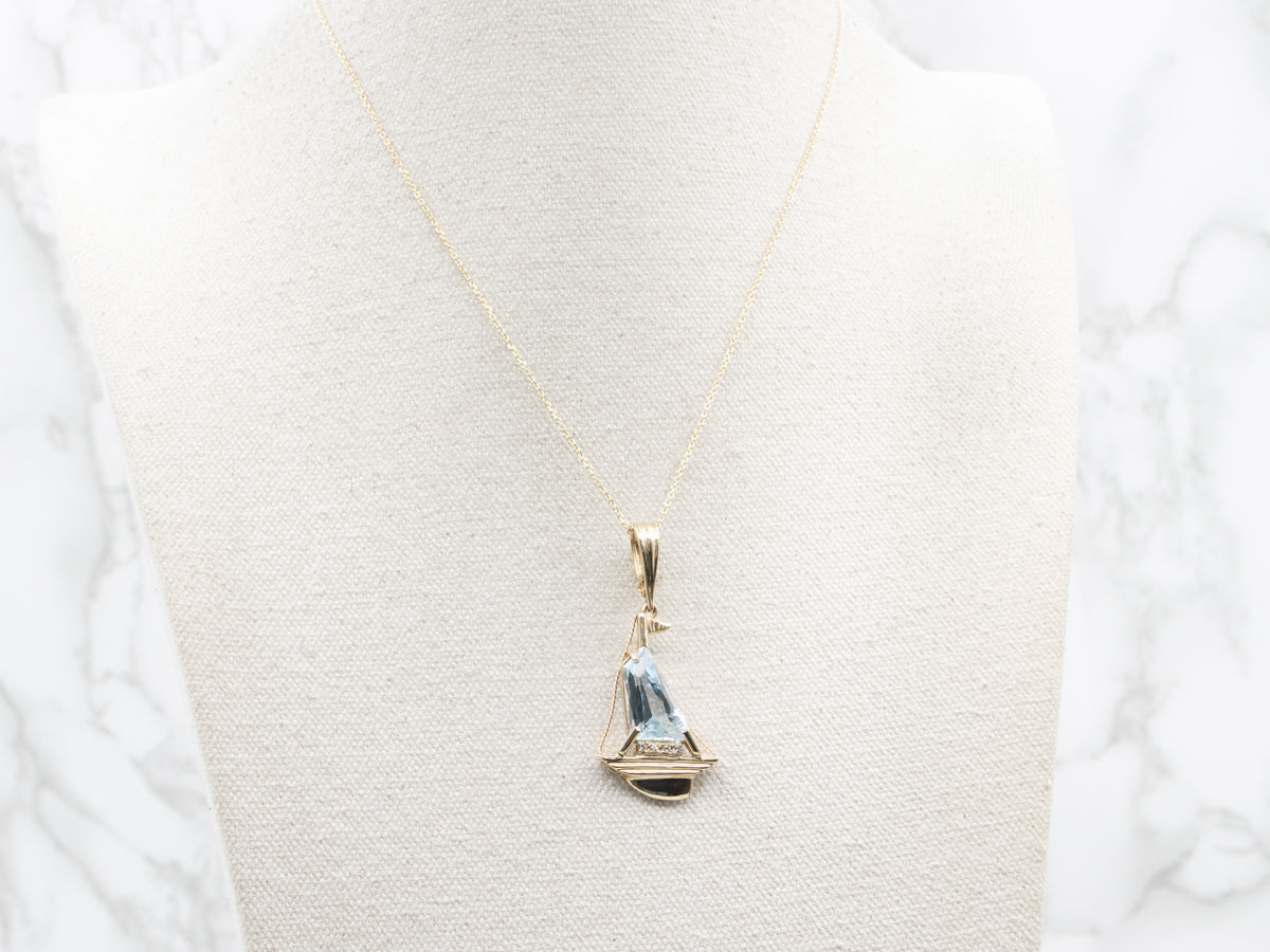 Modern Gold Blue Topaz Sailboat Pendant