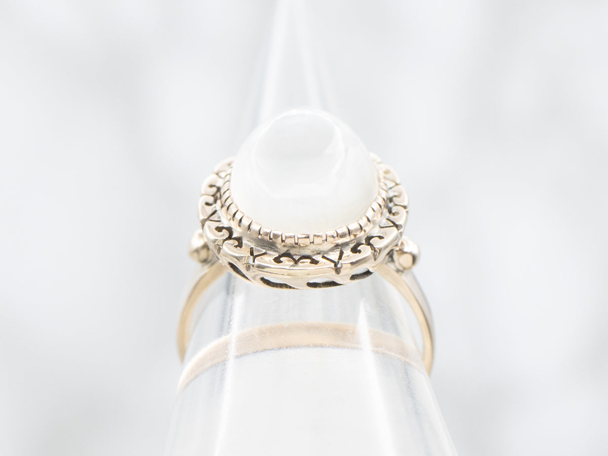 Vintage Moonstone Ring with Decorated Frame