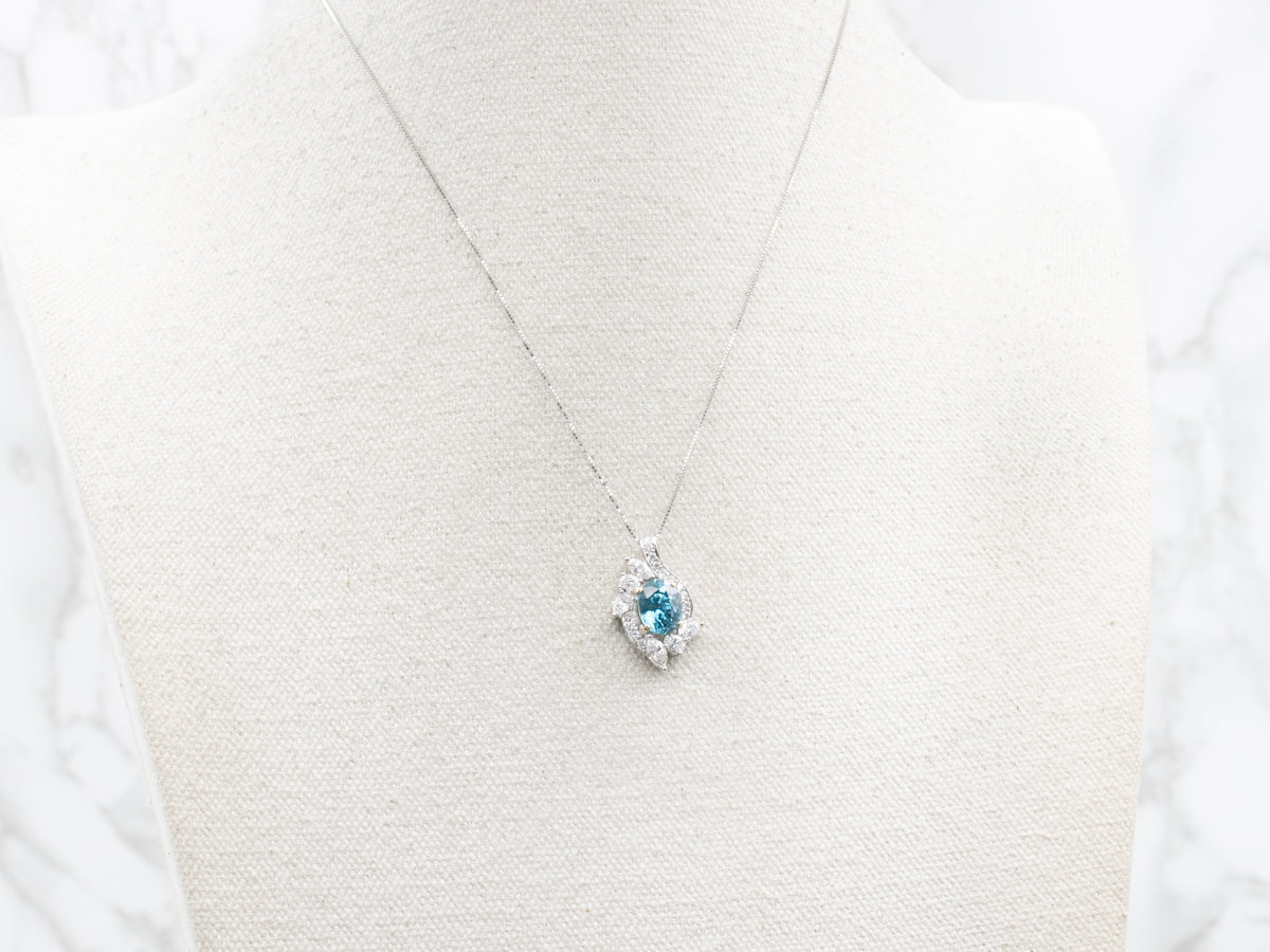 Bright Gold Blue Zircon and Diamond Pendant