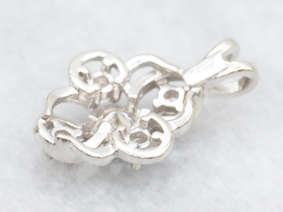 Dainty Gold Diamond Knot Pendant