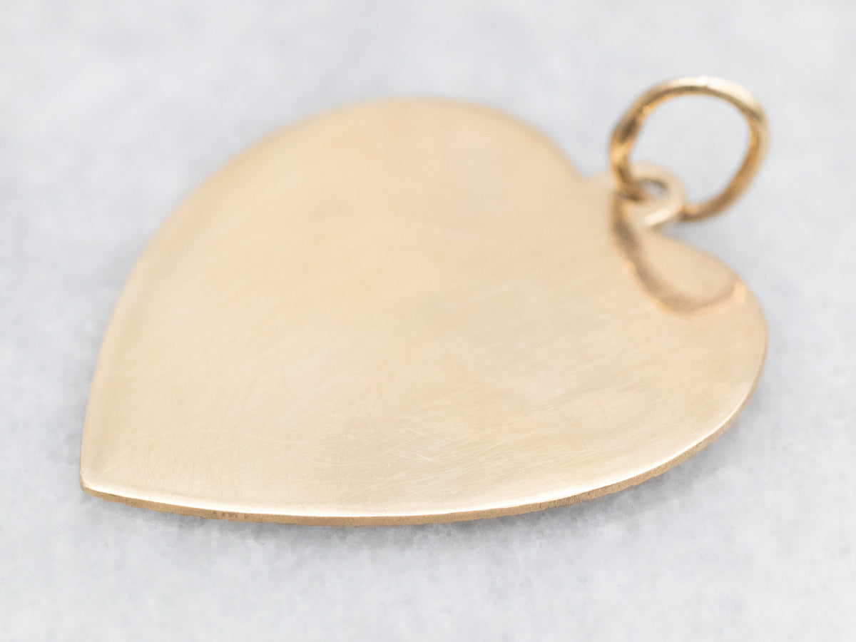 Radiating Gold Heart Pendant