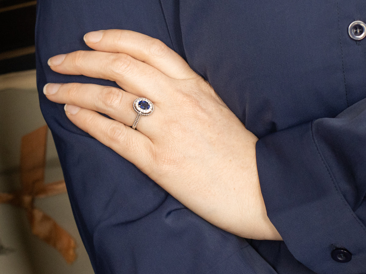 Modern Gold Sapphire and Diamond Halo Ring