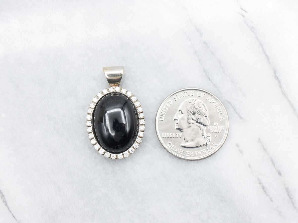 Gold Onyx and Diamond Halo Pendant