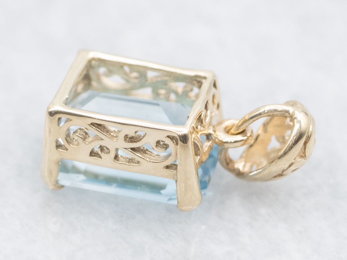 Gold Blue Topaz Pendant with Filigree Bail