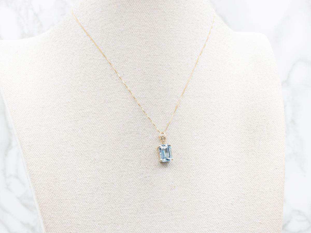 Gold Blue Topaz Pendant with Filigree Bail