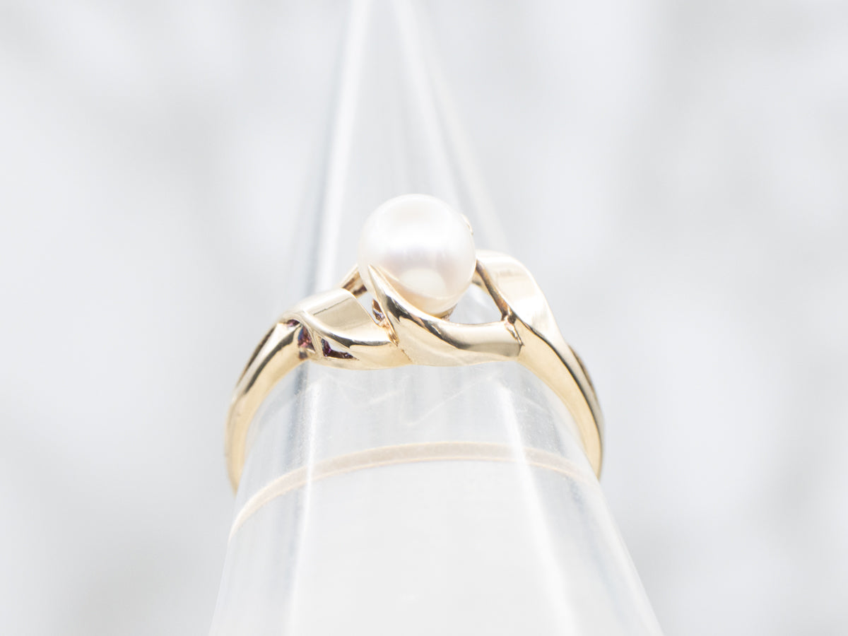 Twisting Gold and Pearl Solitaire Ring
