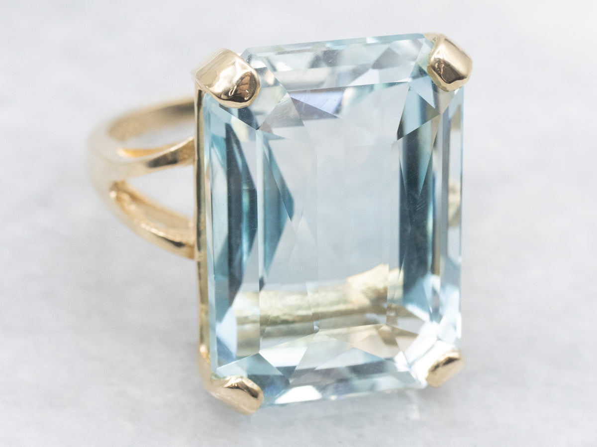 Blue Topaz Cocktail Ring in Yellow Gold