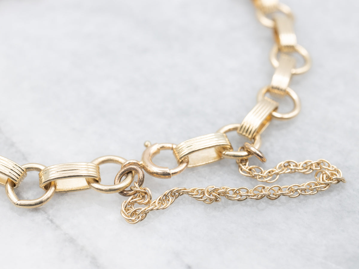 Gold Rolo and Lined Oval Link Bracelet