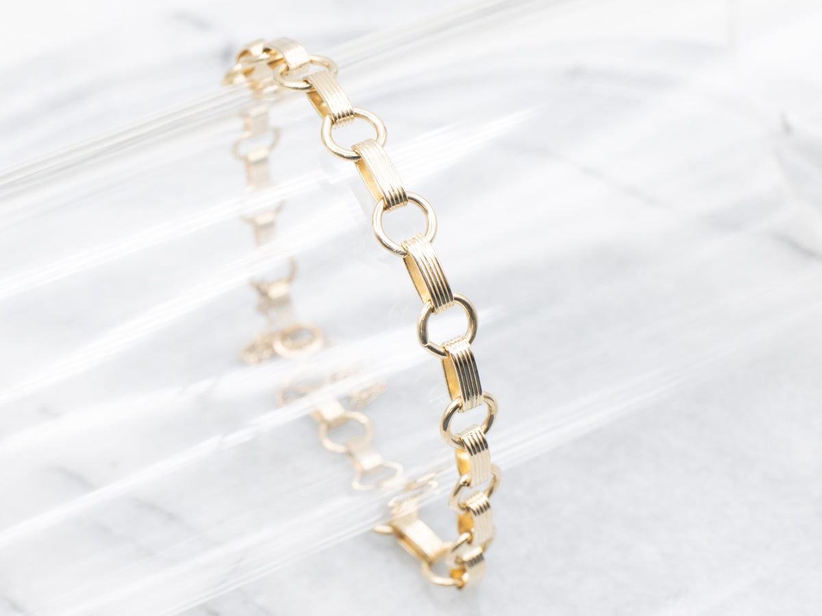 Gold Rolo and Lined Oval Link Bracelet