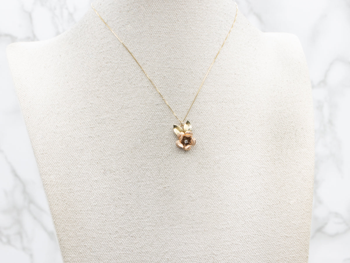 Two-Toned Gold Diamond Flower Pendant