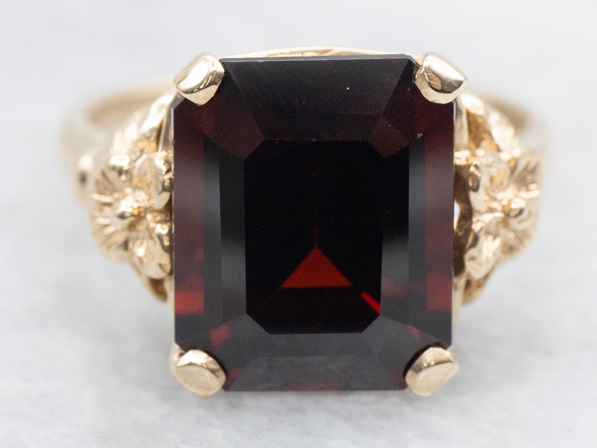 Vintage Gold and Garnet Ring with Flower Detail