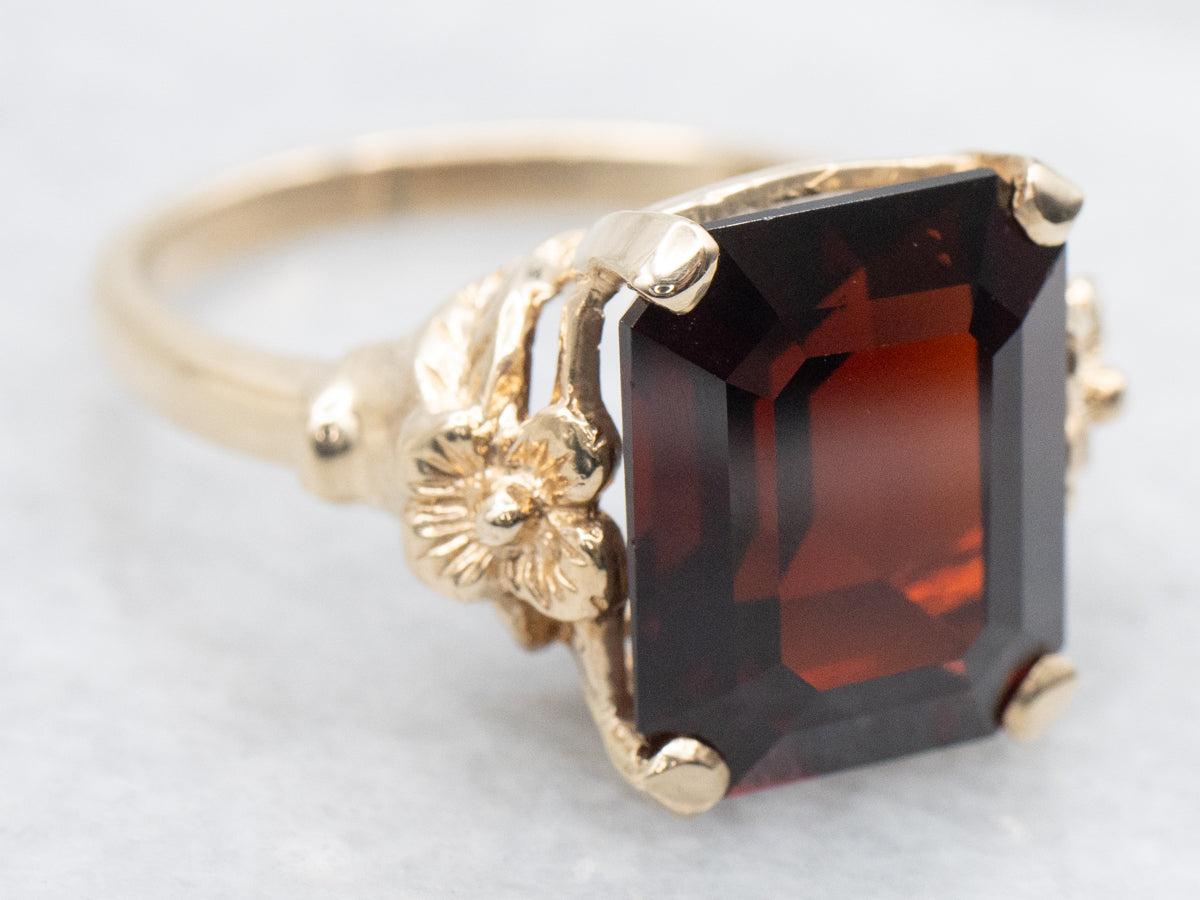 Vintage Gold and Garnet Ring with Flower Detail